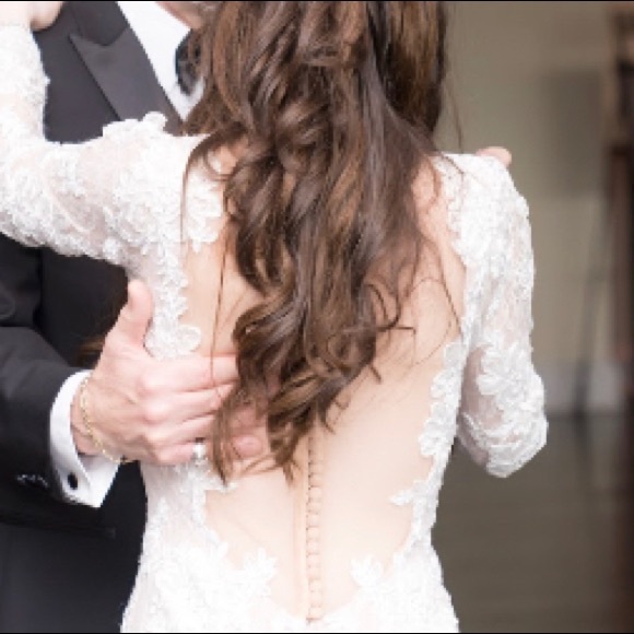 Petite long sleeve plunging v-neckline ivory lace wedding gown